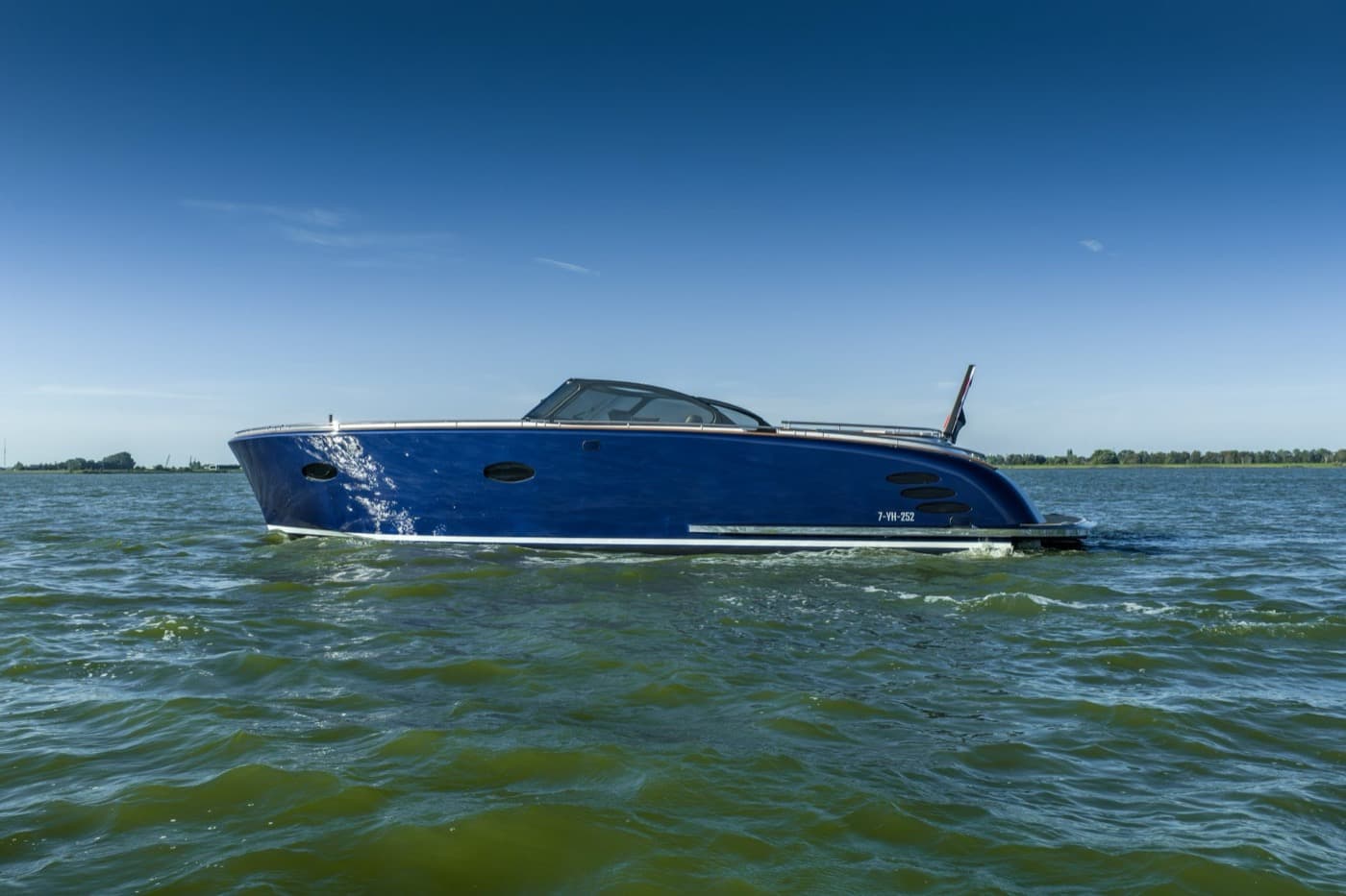 Side view of the dark blue Tristian 44