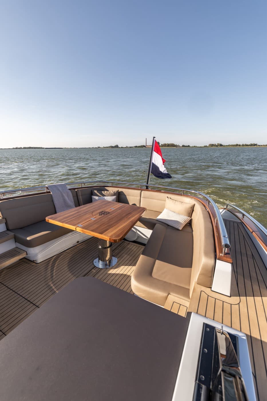 Aft deck lounge with teak table