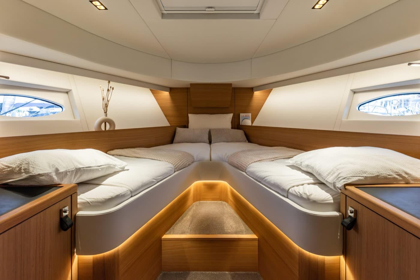 Master cabin with bed and indirect lighting