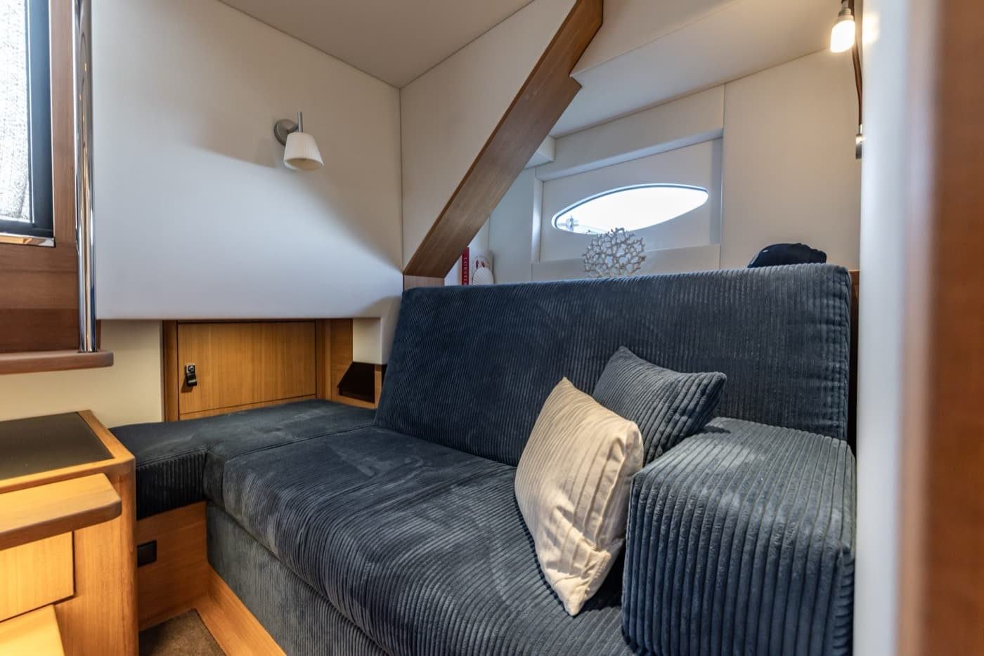 Sofa with cushions and porthole