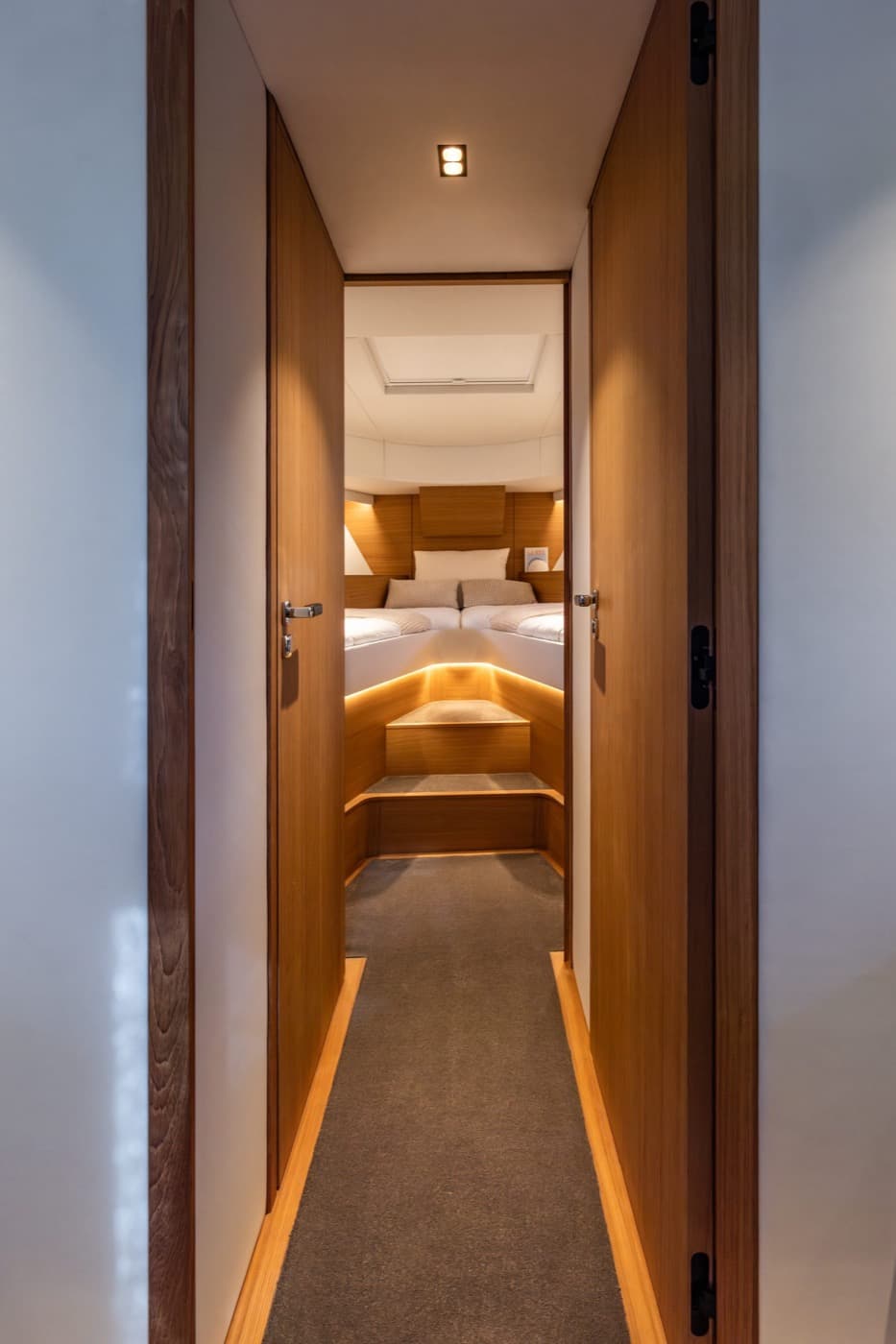 Wood-panelled corridor to the master cabin
